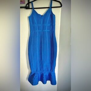 Boutique style blue ribbed dress with ruffle hem